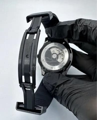 Custom S. Mod 42mm Full Black Aquanaut w/ Yellow Seconds & Date — image 6